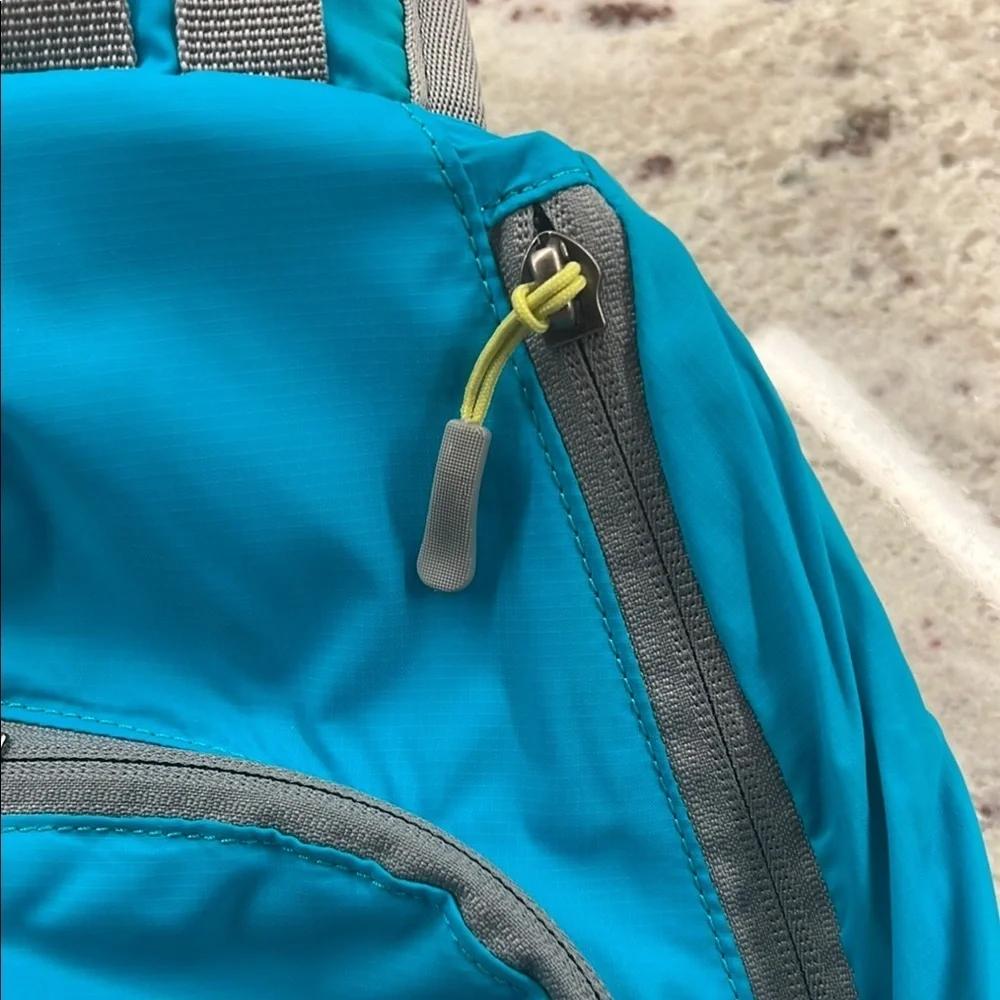 Eddie Bauer Teal Sling Shoulder Bag Backpack Crossbody Bag Multiple Compartments